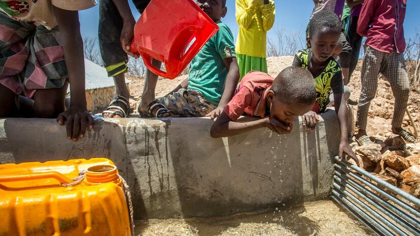 Children in a village near Hargeisa drink fresh water delivered to them to help them cope with drought. Somalia is one of several countries in the horn of Africa affected by drought and hunger as a result of three failed rainy seasons.