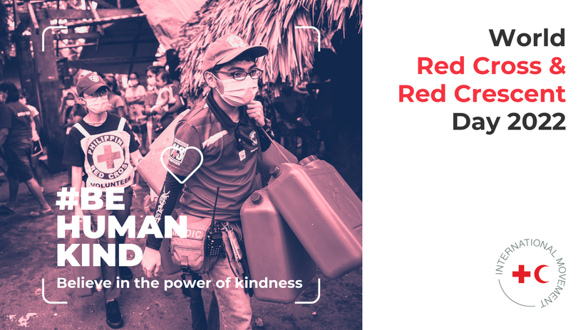 #BeHumanKind campaign image for World Red Cross and Red Crescent Day 2022 featuring two Philippine Red Cross volunteers carrying medical supplies
