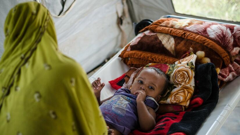 A young boy is treated for acute watery diarrhoea and cholera in a treatment centre set up by the Somali Red Crescent, with support from Canadian and Norwegian Red Cross, in 2017.