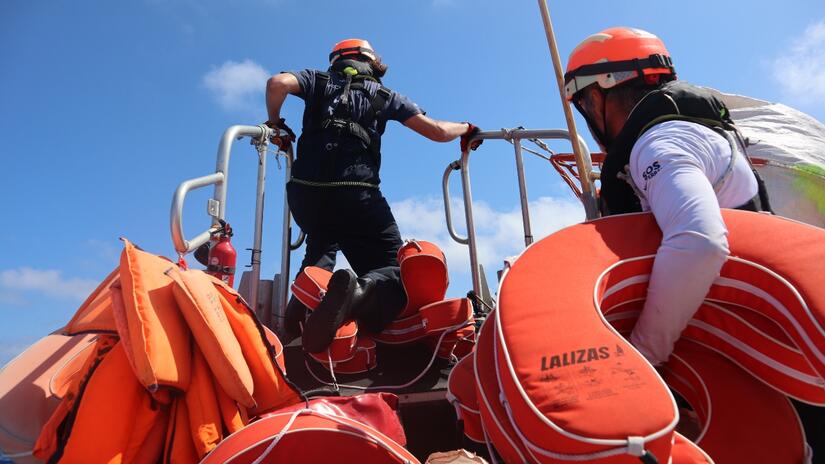 SOS MEDITERRANEE rescue teams approach a boat in distress in international waters off the Libyan coast on Friday 7 July.