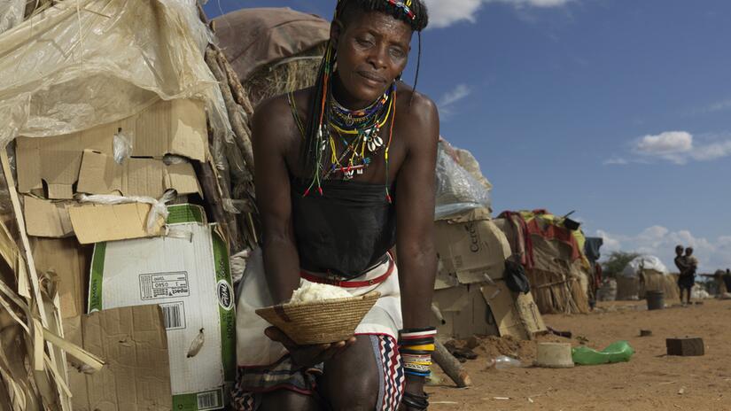 Mwandjukatji from Angola sits in a camp for migrants close to the town of Omusati, near Namibia’s northwestern border with Angola.