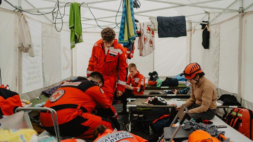 Volunteers set up temporary shelters as part of the disaster exercise.