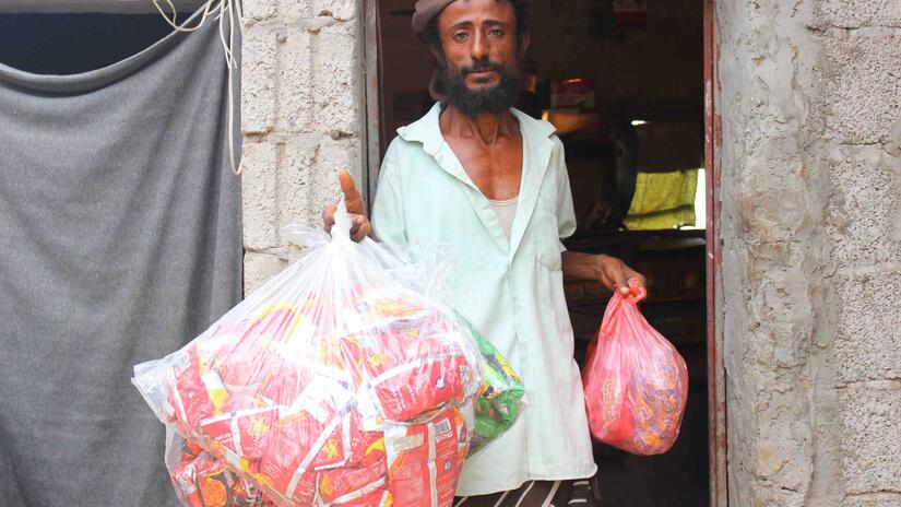 Cash assistance has allowed 39-year-old Ahmed to open a small grocery business and support his young family.