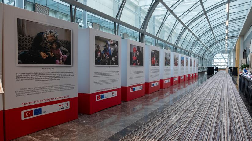 An exhibit in Ankara highlighting the positive impacts of ESSN for refugees from Syrian living in Türkiye and showcasing the collaboration between the IFRC, Türk Kızılay and the European Union.