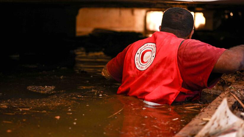 Climate change likely played a role in the disaster, evidenced by the abnormal amount of rain dumped on the area during the storm, according to researchers.