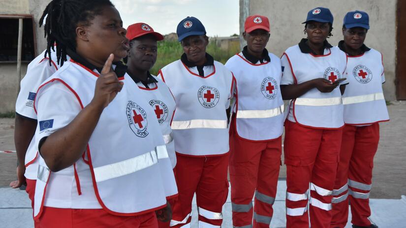 Fortune (left) and her team are the first line of defence for their community against cholera. They run the Oral Rehydration Point in Hopley Farm and live in the same community.