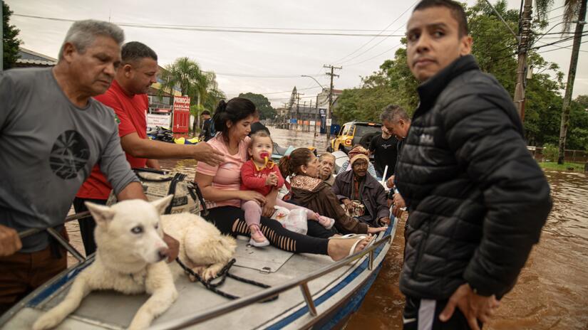 People are evacuated from a flooded area in Porto Alegre, Rio Grande do Sul State, Brazil