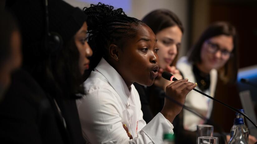 A participant in the IFRC Youth Forum makes a point during a panel discussing the IFRC Youth Engagement Strategy