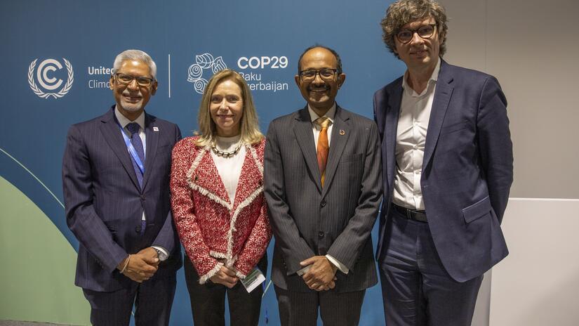 IFRC Secretary General Jagan Chapagain (left) with representatives from three other organizations leading key pillars of the EW4All: (left to right) Celeste Saulo, Secretary-General of the World Meteorological Organization; Kamal Kishore, Special Representative of the United Nations Secretary-General for Disaster Risk Reduction, and Tomas Lamanauskas, Deputy Secretary-General of the International Telecommunication Union.