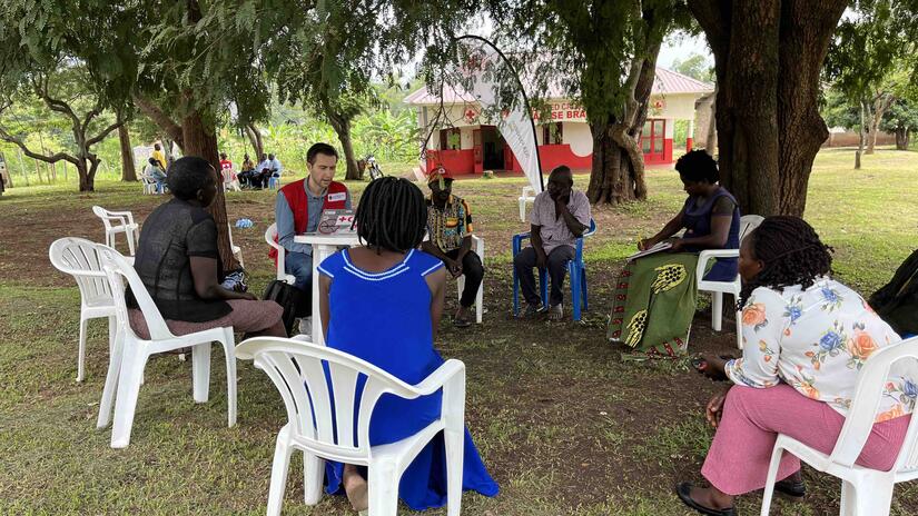 Staff and volunteers from URCS and the NLRC are engaged in focus group discussions on leveraging community engagement in anticipatory action activities.