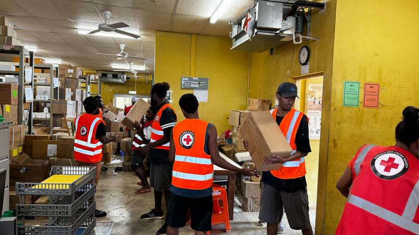 The Vanuatu Red Cross Society prepares to distribute aid to affected communities after the earthquake