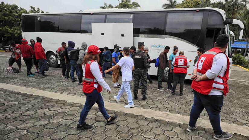 Honduran Red Cross staff receive migrants and provide services at the Centre for Attention to Returned Migrants (CAMR) in Omoa, a town on the Caribbean coast of Honduras.