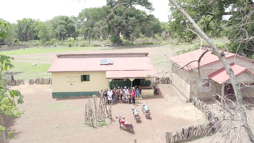 Aerial shot of Kabayaba villagers outside their newly built health post.