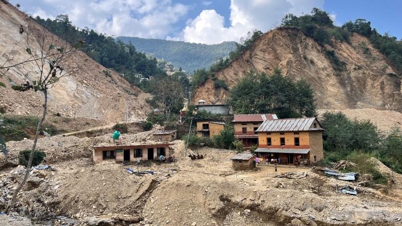 Houses that were once surrounded by green fields, kitchen gardens and trees, now stand shattered amid a field of destruction and rubble.