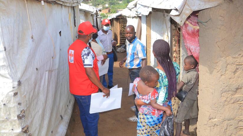 Red Cross volunteers in eastern Democratic Republic of Congo go door to door to ensure communities receive trusted information that will help protect them from the Ebola outbreak.