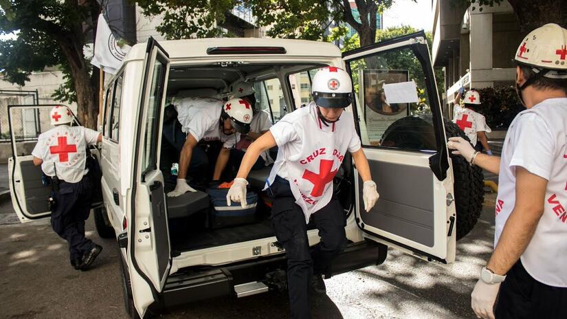 Volunteers of the Venezuela Red Cross respond to humanitarian needs within the country.