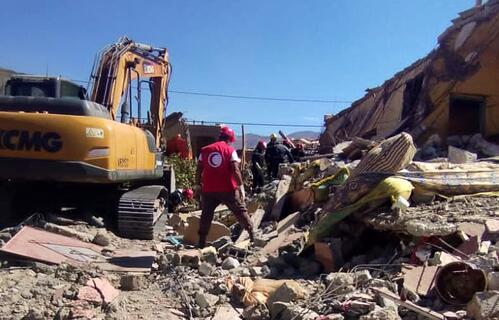 A Moroccan Red Crescent volunteer assists with search and rescue activities following a devastating 6.8 magnitude earthquake that struck the country on 8 September 2023.