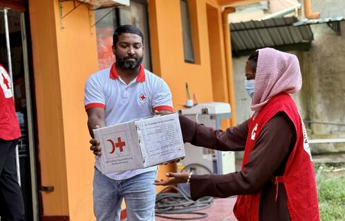 Teams from the Sri Lanka Red Cross Society’s Gampaha Branch prepare relief supplies for families following devastating floods caused by Tropical Cyclone Ditwah.
