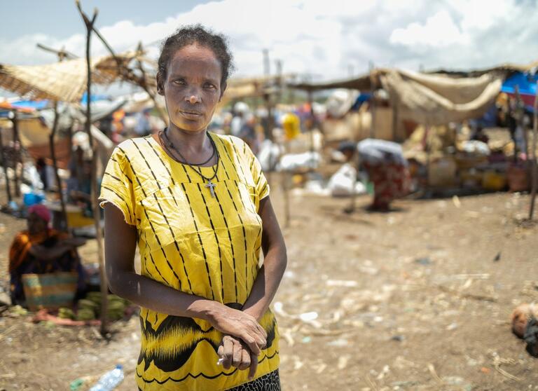 A woman stands for a photo in April 2021 in Arba Minch, Ethiopia - an area affected by conflict, drought, epidemics, food insecurity and pest outbreaks.
