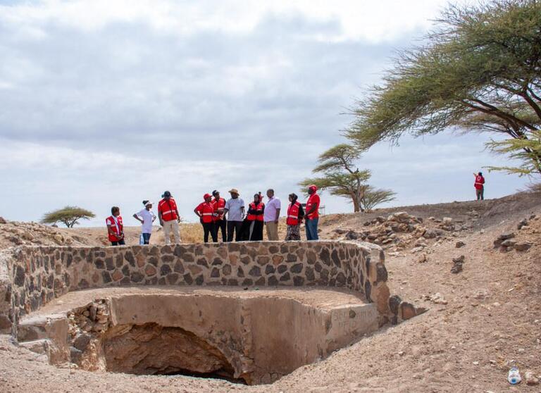 Kenya Red Cross inspects dried up community well.