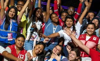 Youth volunteers from Red Cross and Red Crescent societies around the world celebrate together as part of the Solferino gathering in 2019