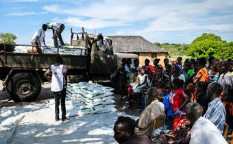 Zambia Red Cross volunteers deliver mielie meal bags to remote communities near Mongu, Western Zambia to tackle food insecurity