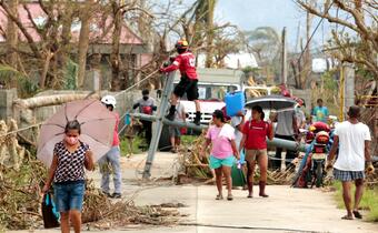 Philippine Red Cross staff and volunteers conduct life-saving search and rescue activities in Southeastern Luzon following three typhoons and two tropical storms hitting the area within three weeks