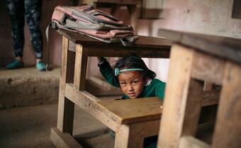 Children in Dhankuta, Nepal learn how to take shelter from an earthquake and how to provide first aid from the Finnish Red Cross in 2014