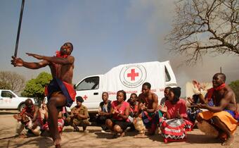 Baphalali Eswatini Red Cross youth volunteers perform a drama to educate the community members of Mhlangatane about HIV/AIDS