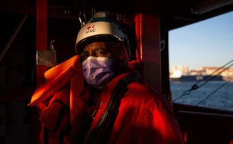 Abdel, a cultural mediator with the Italian Red Cross, stands on board the Ocean Viking rescue ship where he provides assistance to people rescued from the central Mediterranean