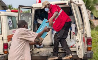 Volunteers for the Red Cross of the Democratic Republic of the Congo unload emergency supplies to contain the 2025 Ebola outbreak.