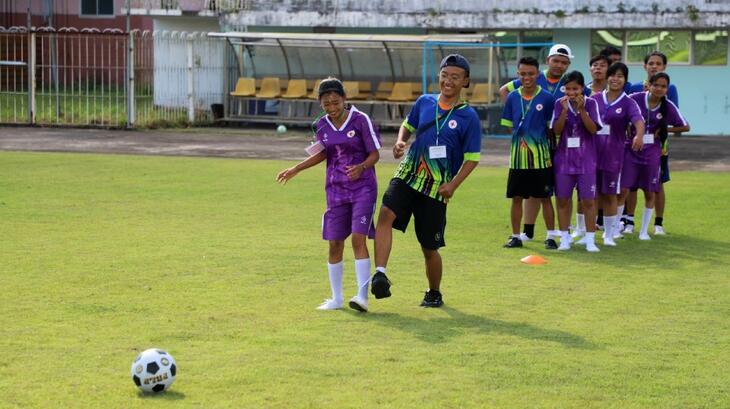 Kids in Mon State, Myanmar line up to take a shot as part of the IFRC and Generation Amazing's joint project uniting youth through the power of football