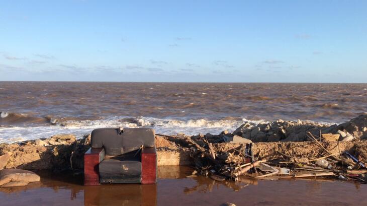 An empty armchair sits amid remains of a destroyed building on the coast of north-eastern Libya after Storm Daniel in September 2023.